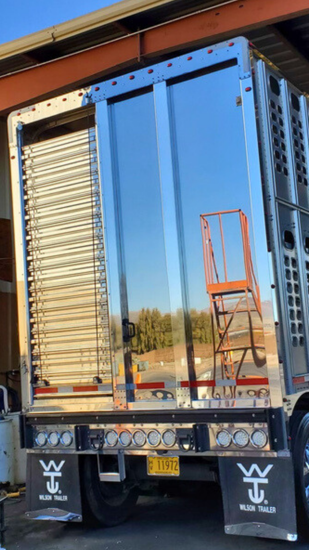 Polished chrome trailer doors at The New Vernon Truck Wash Polish Bay.